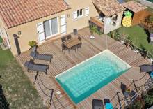 Manhattan 6 m avec banquette arrondie et escaliers diagonaux à La Seyne-sur-Mer.