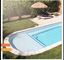 piscine rectangulaire avec plage immergée arrondie