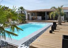 Bassin Manhattan 6 m installé à Brignoles, alliant élégance et confort.